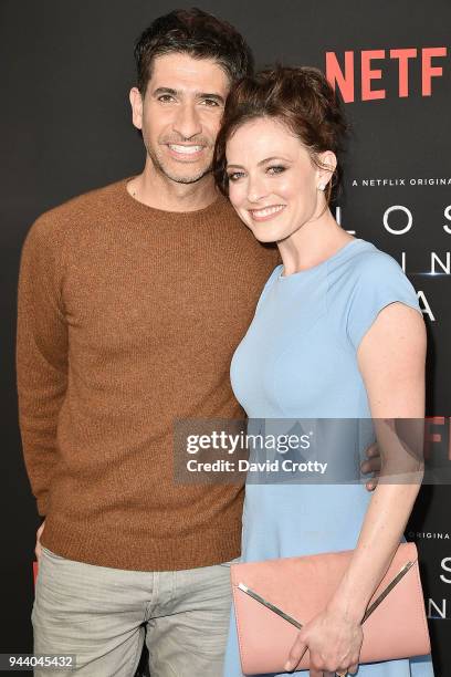 Raza Jeffrey and Lara Pulver attend the "Lost In Space" Season 1 Premiere at ArcLight Cinerama Dome on April 9, 2018 in Hollywood, California.