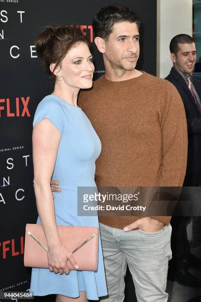Lara Pulver and Raza Jeffrey attend the "Lost In Space" Season 1 Premiere at ArcLight Cinerama Dome on April 9, 2018 in Hollywood, California.