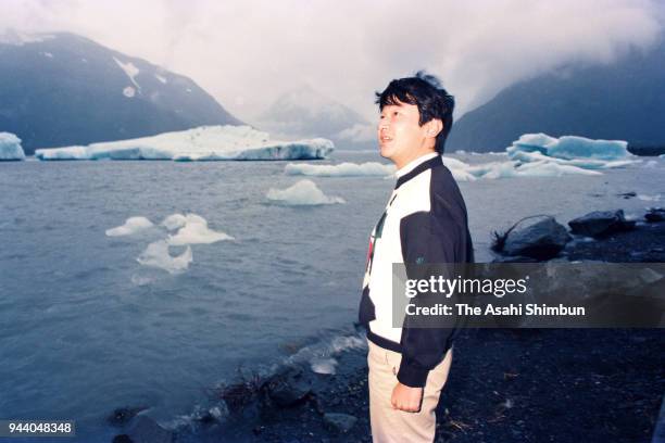 Crown Prince Naruhito visits the Portage Glacier on way back from Belgium on August 25, 1990 in Alaska.