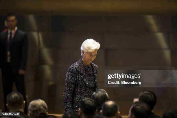 Christine Lagarde, managing director of the International Monetary Fund , walks off stage after speaking at the Boao Forum for Asia Annual Conference...