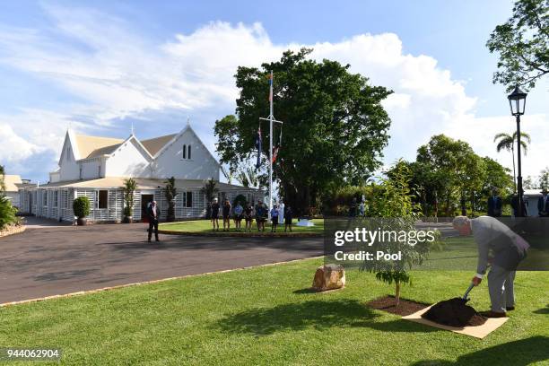 Prince Charles, Prince of Wales plants a tree at a tree planting ceremony during a reception at Government House on April 10, 2018 in Darwin,...