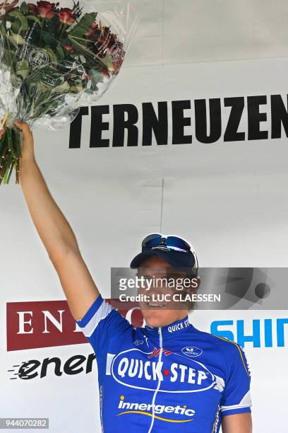 Belgian Wouter Weylandt of Quickstep Innergetic team celebrates on the podium after winning the fourth stage of Tour of Benelux 26 August 2007, from...