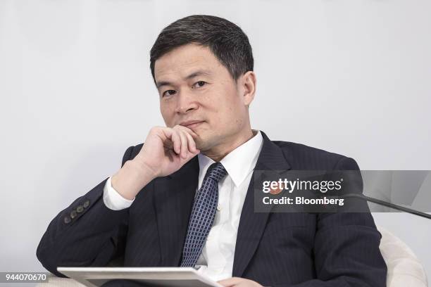 Fang Xinghai, vice chairman of the China Securities Regulatory Commission, listens during a session at the Boao Forum for Asia Annual Conference in...