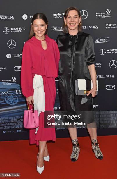 Hannah Herzsprung and Christiane Paul attend the 'Steig. Nicht. Aus!' Premiere on April 9, 2018 in Berlin, Germany.