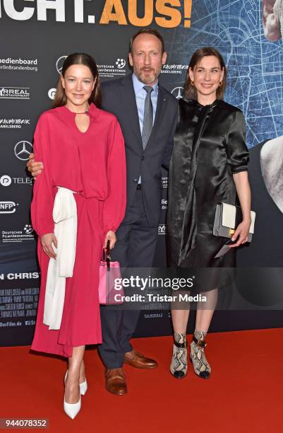 Hannah Herzsprung, Wotan Wilke Moehring and Christiane Paul attend the 'Steig. Nicht. Aus!' Premiere on April 9, 2018 in Berlin, Germany.