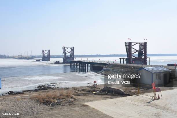 The Heihe-Blagoveshchensk road bridge is under construction at the border of China and Russia on April 10, 2018 in Heihe, China. The 19.9km bridge...