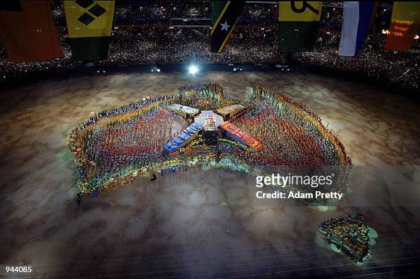 Performers gather to create a map of Australia during the Opening Ceremony of the Sydney 2000 Olympic Games at the Olympic Stadium in Homebush Bay,...