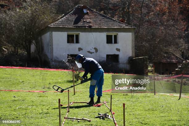 Member of Mine Action Centre of the Republic of Serbia conducts minesweeping works at Ravno Bucje village of Bujanovac district where two civilians...