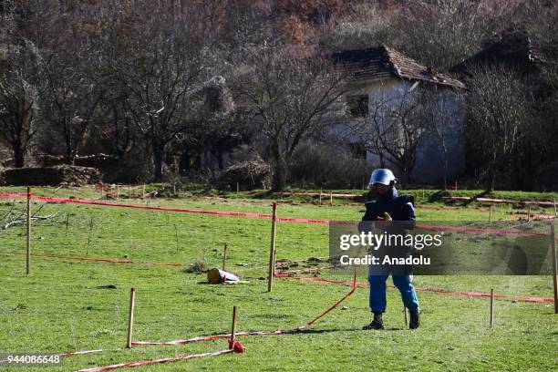 Member of Mine Action Centre of the Republic of Serbia conducts minesweeping works at Ravno Bucje village of Bujanovac district where two civilians...