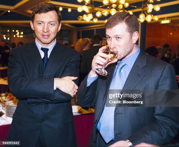 Russian Billionaire Oleg Deripaska left, and Roman Abramovich, attend a meeting between Russian president Vladimir Putin and Russian businessmen at...
