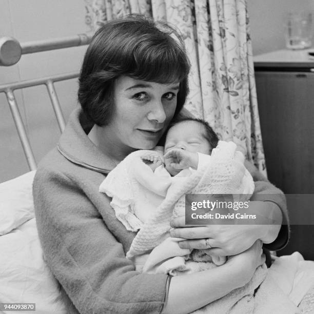 British actress Ann Beach with her newborn daughter Charlotte Coleman , UK, 5th April 1968.