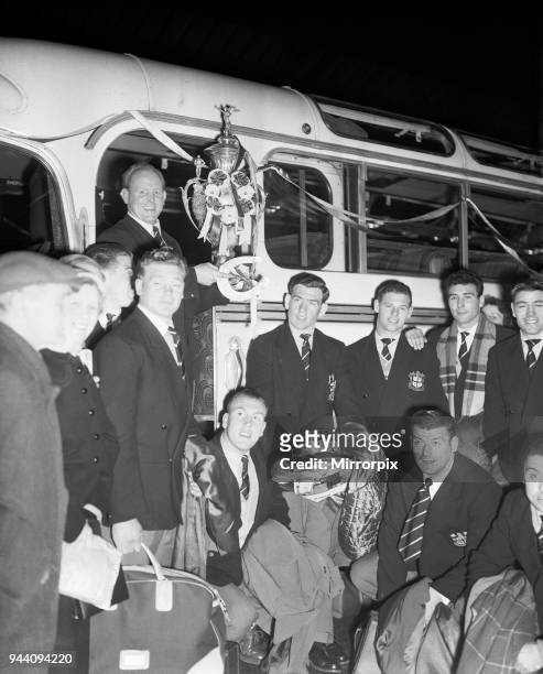 Alan Prescott holds the Rugby League Cup aloft as the St Helens team arrive at the Town Hall for a civic reception to celebrate their 13-2 victory...
