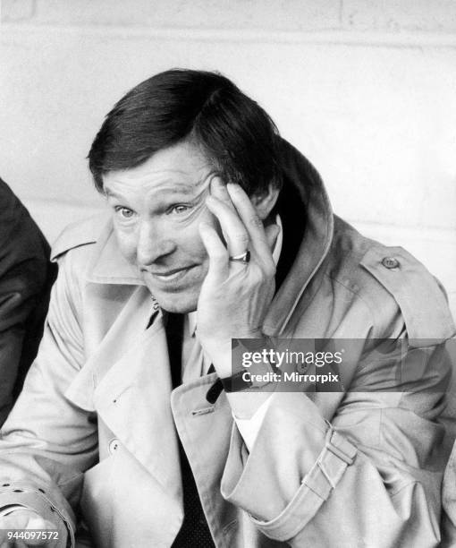 New Manchester United manager Alex Ferguson watches his side lose 2-0 against Oxford United in their League Division One clash at the Manor Ground,...