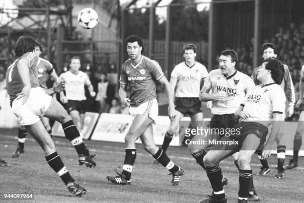 English League Division One match at The Manor Ground, Oxford United 2 v Manchester United 0, United's Bryan Robson shoots past teammate Paul McGrath...