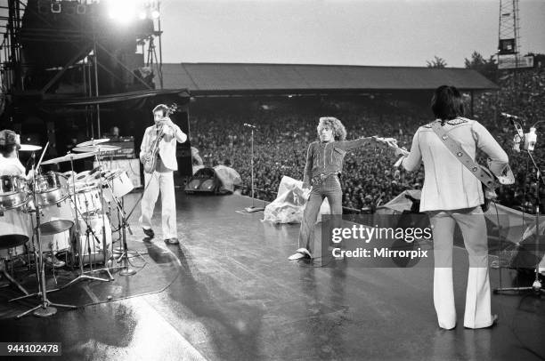 The Who rock group performing at The Valley, home of Charlton Athletic football club. Pictured left to right are: Keith Moon on drums, Pete...