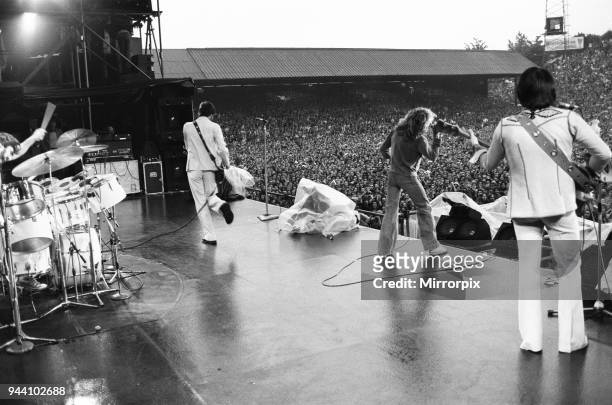 The Who rock group performing at The Valley, home of Charlton Athletic football club. Pictured left to right are: Keith Moon on drums, Pete...