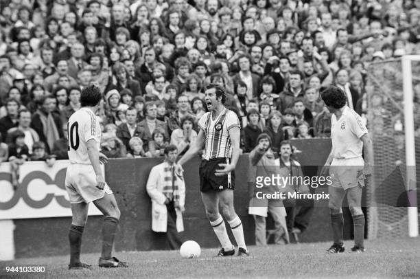 Southampton 2-2 Bolton, League match at The Dell, Saturday 22nd October 1977, Saints striker Peter Osgood is berate with the linesman after being...