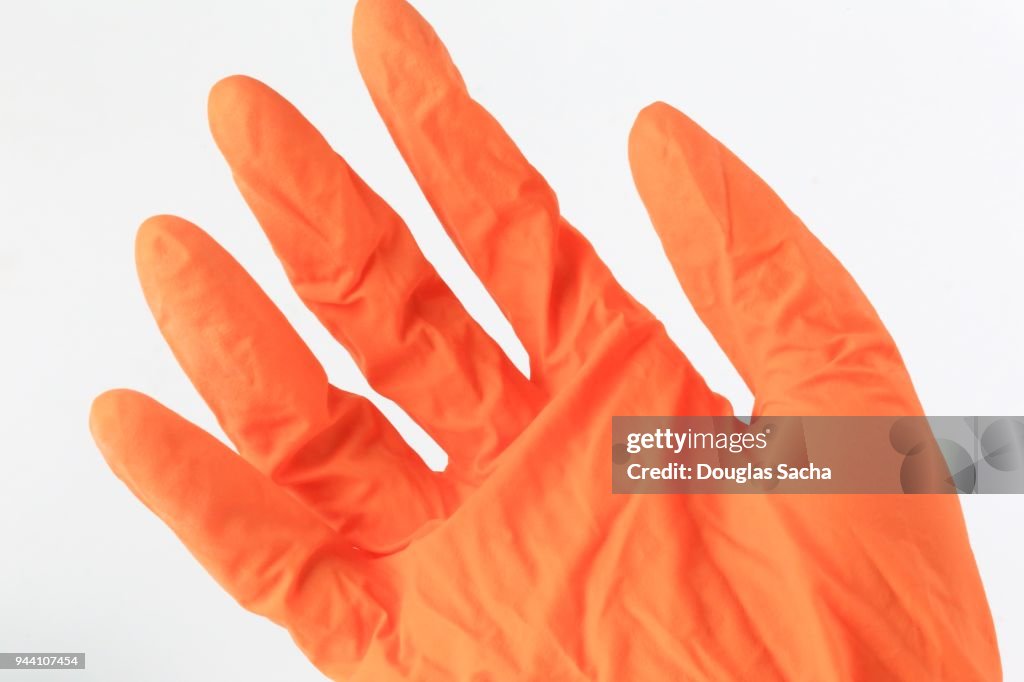 Surgical grade Nitrile Rubber Glove on a healthcare workers hand