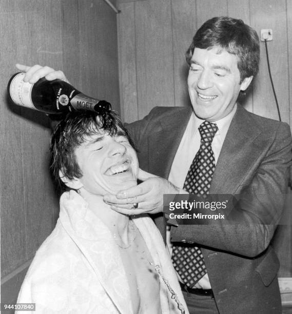 Leyton Orient 1-1 Southampton, league match, Tuesday 25th April 1978. Southampton's scorer Tony Funnell happily has a champagne shampoo from Manager...