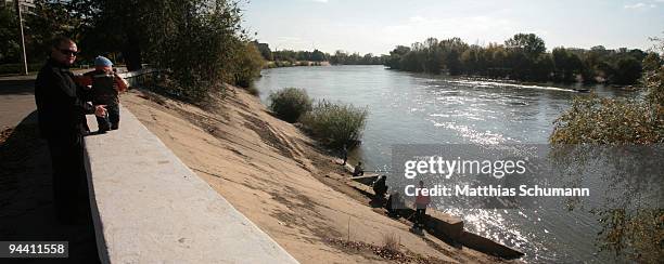 Child watches anglers fishing October 19, 2008 in the river Dniester in Tiraspol in the Transnistria region in Moldova. Tiraspol is the second...