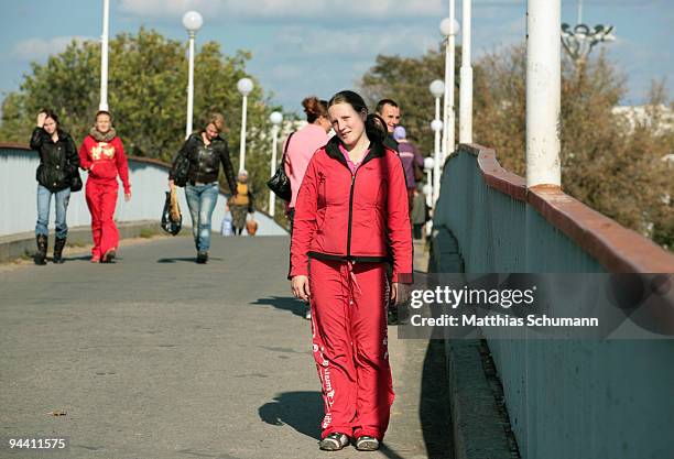 Girl poses on a bridge over the river Dniestre on October 19, 2008 in Tiraspol, Moldova. Tiraspol is the second largest city in Moldova and is the...