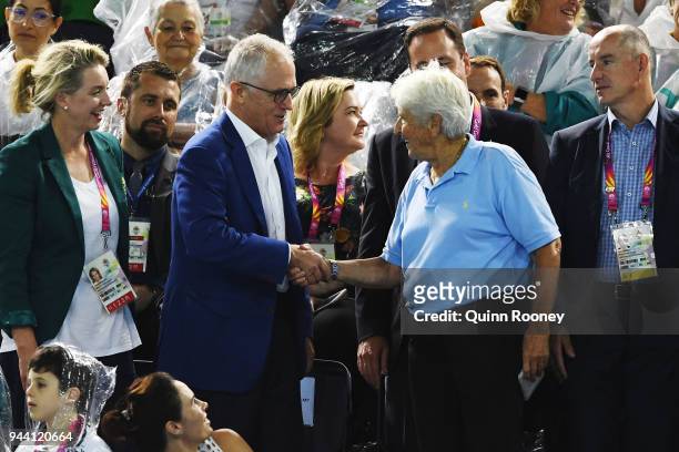 Prime Minister of Australia Malcolm Turnbull meets with Dawn Fraser during the swimming on day six of the Gold Coast 2018 Commonwealth Games at Optus...