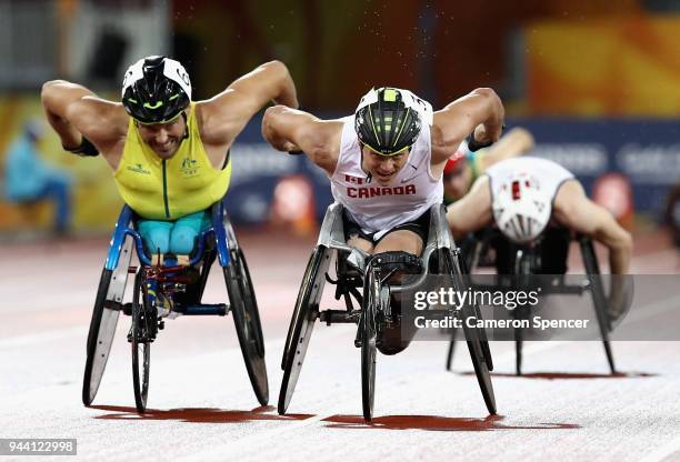 Alexandre Dupont of Canada and Kurt Fearnley of Australia race to the finish line in the Mens T54 1500 metres during the Athletics on day six of the...