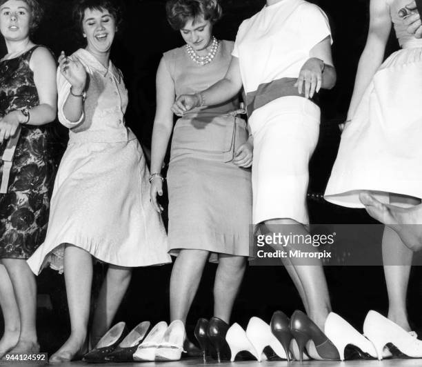 High heels discard as the girls join in the high jinks at the Locarno in Glasgow, which re-opened to the public last night, 27th September 1962.