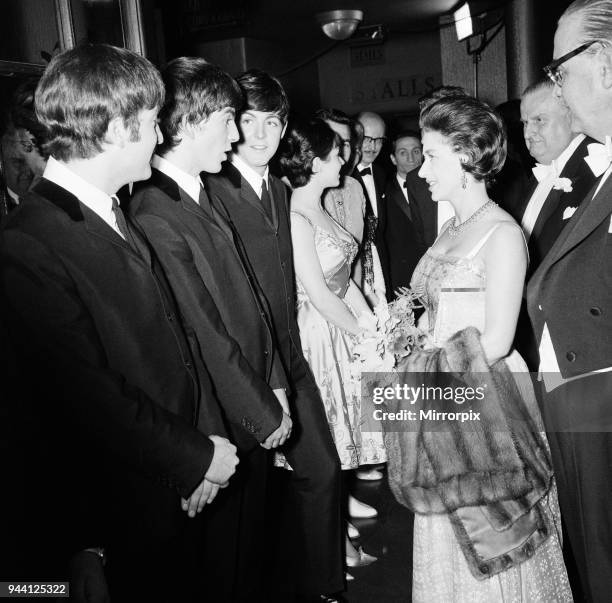 The Royal Variety Performance 4th November 1963 Princess Margaret is introduced to The Beatles, She talks with George Harrison. Ringo Starr is out of...