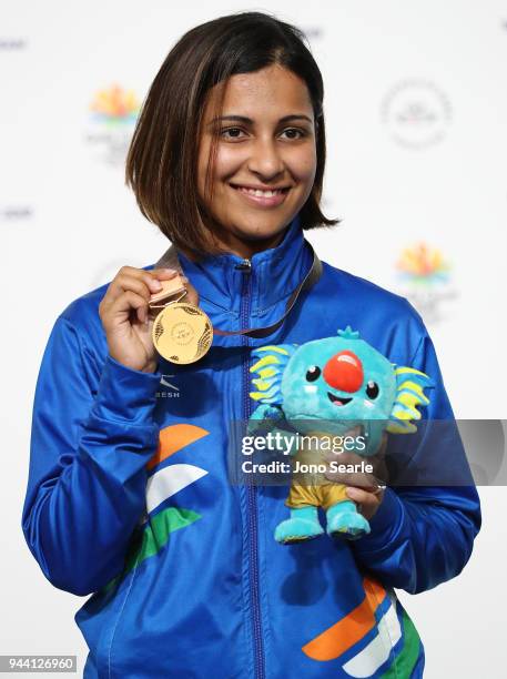 Gold medalist Heena Sidhu of India poses during the medal ceremony for the women's 25m pistol during Shooting on day six of the Gold Coast 2018...