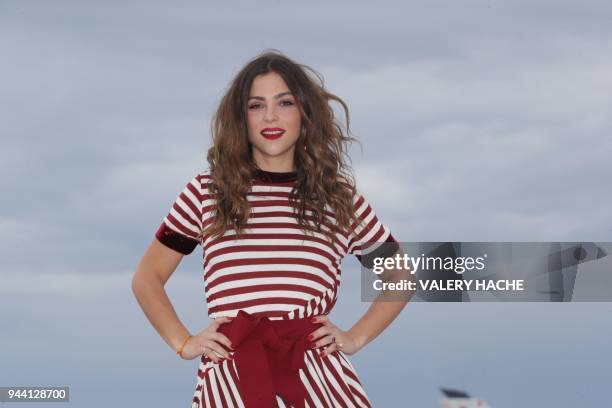 Colombian actress Paulina Davila poses during a photocall for "Aqui en la tierra", on April 10, 2018 in Cannes, as part of Canneseries International...