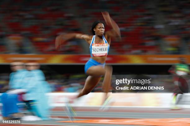 Lesotho's Lerato Sechele competes in the athletics women's triple jump final during the 2018 Gold Coast Commonwealth Games at the Carrara Stadium on...