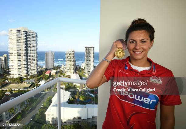 Aimee Willmott of England poses with her Gold medal at team England Headquarters in Main Beach on day six of the Gold Coast 2018 Commonwealth Games...