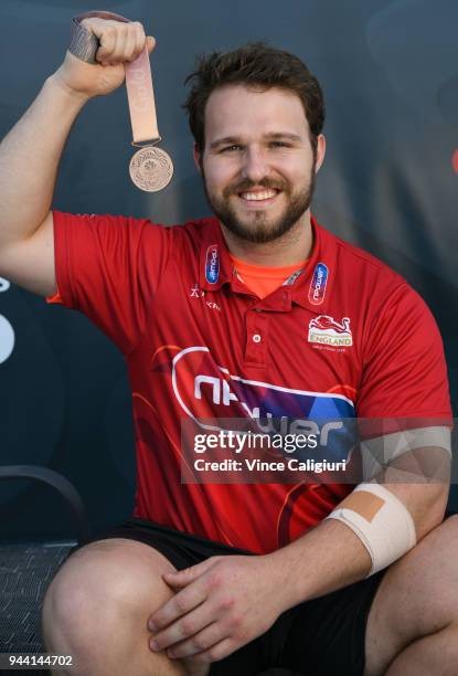 Owen Boxall of England poses with his Bronze medal at team England Headquarters in Main Beach on day six of the Gold Coast 2018 Commonwealth Games on...