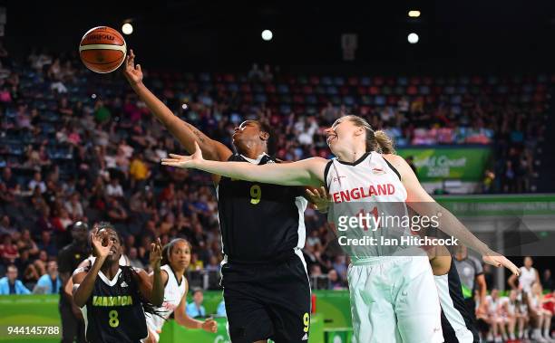 Mollie Campbell of England contests the ball with Althea Byfield of Jamaica during the womens Qualifying Final between England and Jamaica on day six...