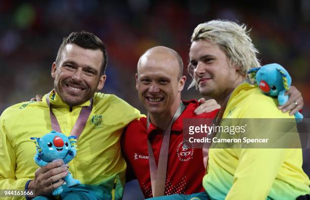 Silver medalist Kurt Fearnley of Australia, gold medalist Alexandre Dupont of Canada and bronze medalist Jake Lappin of Australia pose during the...