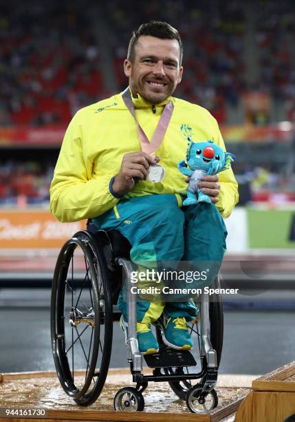 Silver medalist Kurt Fearnley of Australia poses during the medal ceremony for the Mens T54 1500 metres during the Athletics on day six of the Gold...