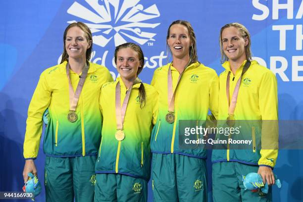 Gold medalists Emily Seebohm, Georgia Bohl, Emma McKeon and Bronte Campbell of Australia pose during the medal ceremony for the Women's 4 x 100m...