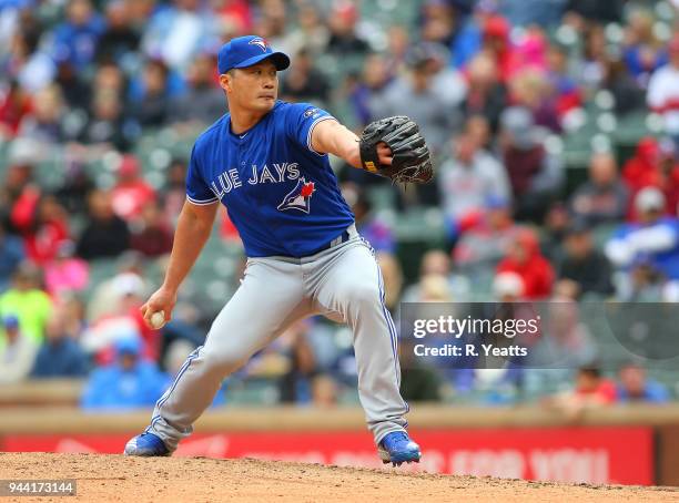 Seung Hwan Oh of the Toronto Blue Jays throws in the eight inning against the Texas Rangers at Globe Life Park in Arlington on April 8, 2018 in...