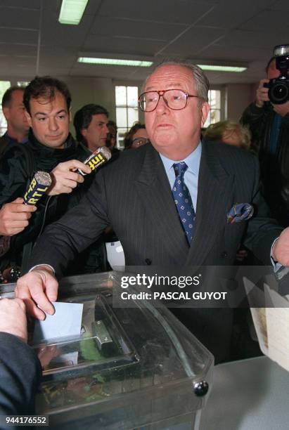 Far-rightist president of the National Front Jean-Marie Le Pen, casts his vote during the first round of the presidential elections in Paris 23 April...