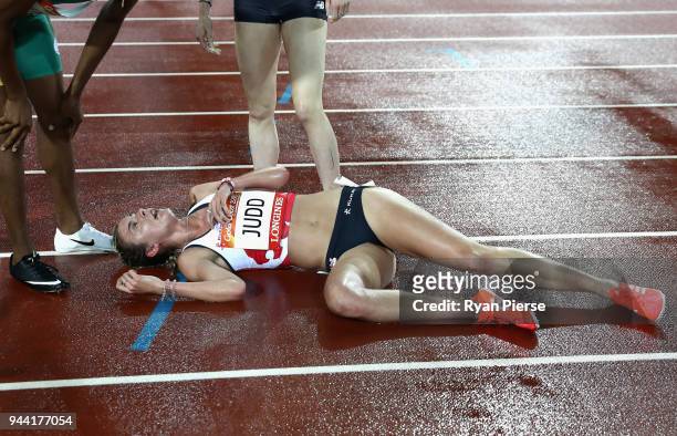 Jessica Judd of England is given assistance after the Women's 1500 metres final during the Athletics on day six of the Gold Coast 2018 Commonwealth...