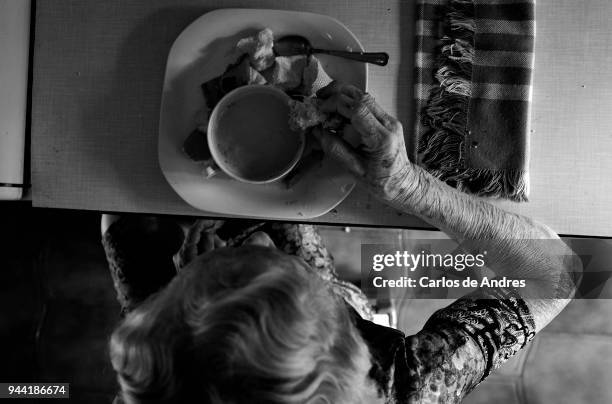 Maria Del Palacio is seen having the breakfast in the kitchen on August 17, 2016 in Madrid, Spain. Maria del Palacio, a ninety-five year old widow,...