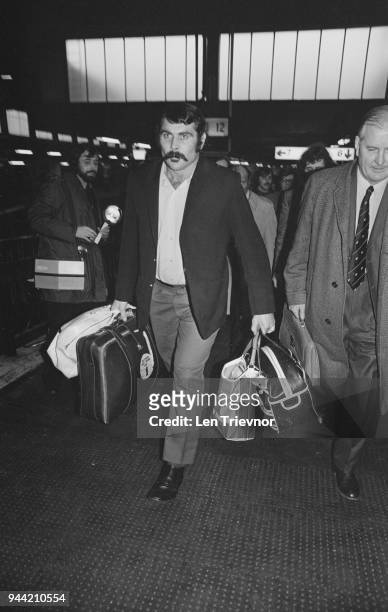 New Zealand rugby union player Keith Murdoch of the All Blacks New Zealand national rugby union team, pictured at Euston Station in London as he...