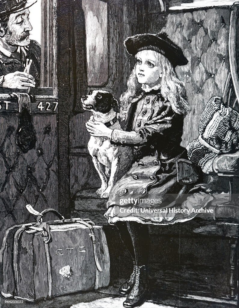A girl and her dog in a railway carriage.