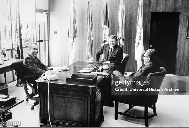 President Richard Nixon with John Wayne and Henry Kissinger in the White House 1968.