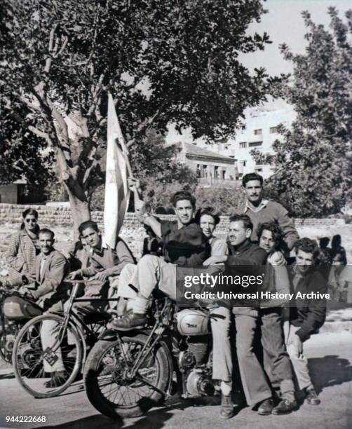 Jews in Jerusalem waving a flag, express joy, after the Partition Plan on November 29, 1947. The United Nations Partition Plan for Palestine was a...