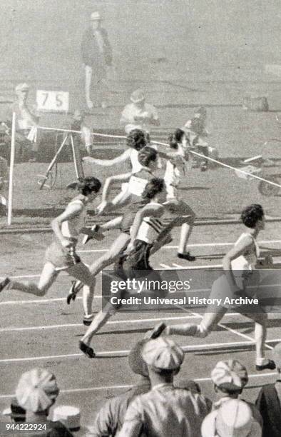 Photograph of Mildred Ella 'Babe' Didrikson Zaharias winning the 80m Hurdles at the 1932 Olympic games. Babe gained world fame in track and field and...