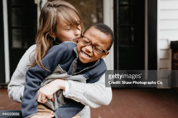 mother and son - diverse family stockfoto's en -beelden