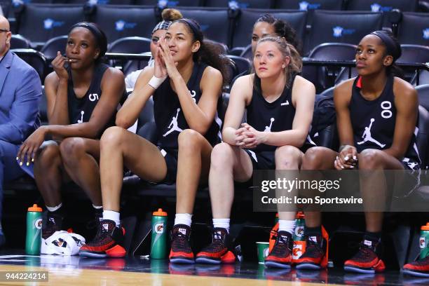 Jordan Brand Classic Away Team forward Queen Egbo on the bench with teammates Jordan Brand Classic Away Team forward Shakira Austin , Jordan Brand...