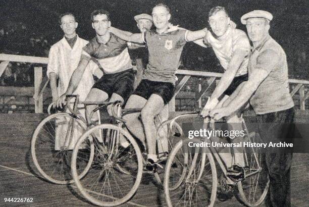 Photograph of the Sprint medalists at the 1932 Olympic games. Jacobus van Egmond from Holland took gold, Louis Chaillot from France took silver &v...